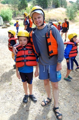 Father and son prepare to head out rafting!