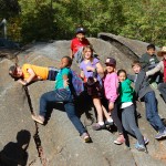 Students climb around at the Marshall Gold Discovery State Historic Park with Heather!