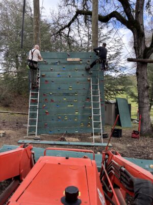 crew replacing climbing wall supports at Mother Lode River Center ropes course in Coloma California